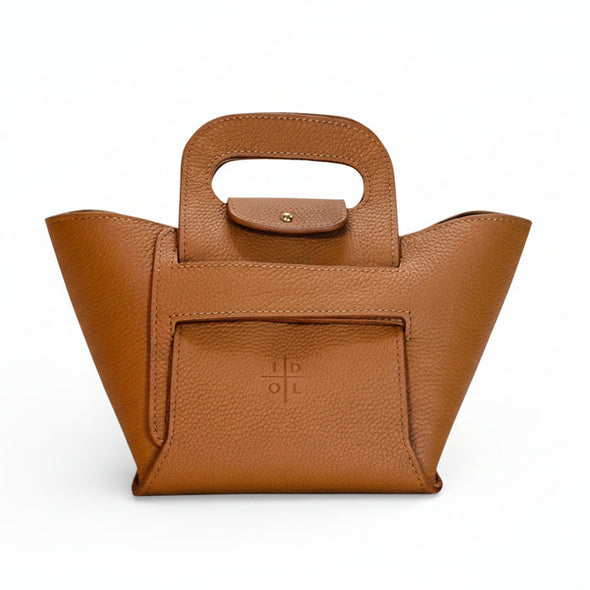 Brown leather handbag with a visible brand logo on a white background