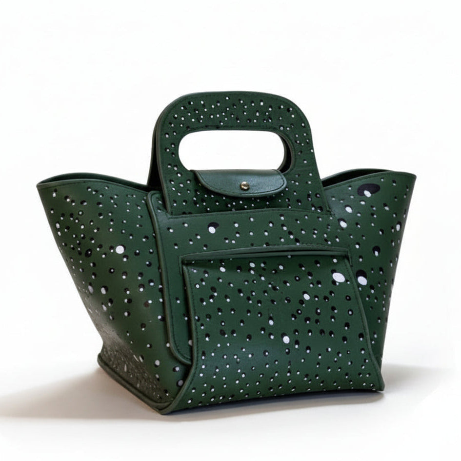 Green handbag with studded details on a white background